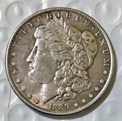 1889 Morgan Silver Dollar - AU/Cleaned